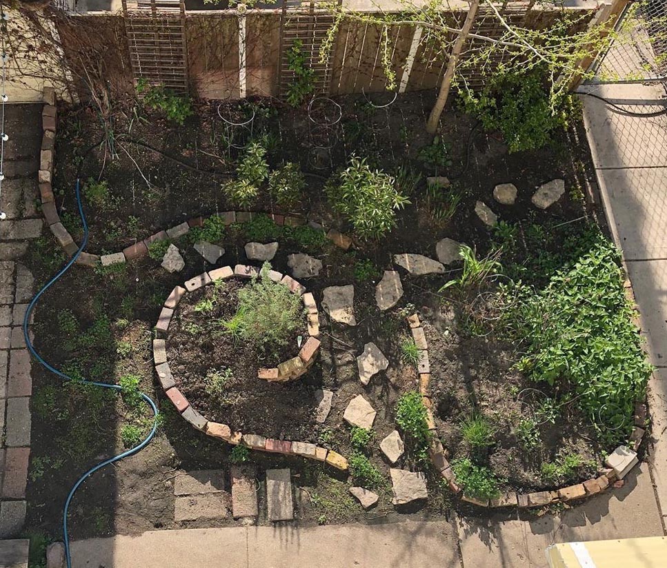 Overhead view of a backyard herb spiral